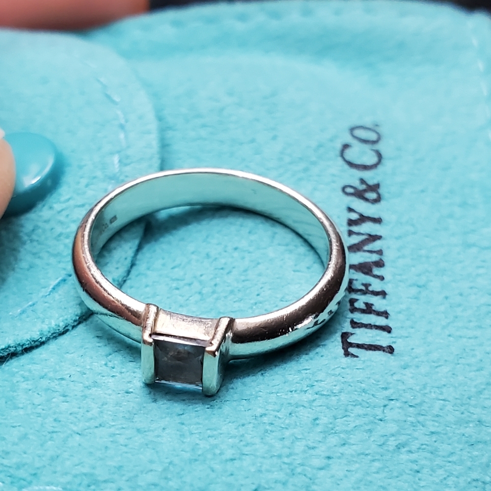 Authentic Tiffany & Co. Ring with light blue gem